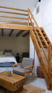 Postel nebo postele na pokoji v ubytování Mas de la Borie -Chambre d'hôtes