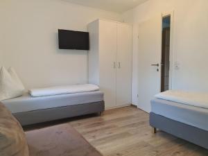 Postel nebo postele na pokoji v ubytování Ferienwohnung Schupfer
