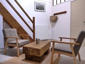 Posezení v ubytování Mas de la Borie -Chambre d'hôtes