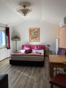 Rúm í herbergi á BnB122 bed&breakfast