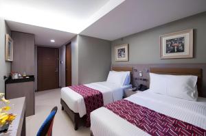 Postel nebo postele na pokoji v ubytování Solace Hotel + 37 fotografií
