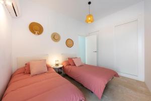 Ένα ή περισσότερα κρεβάτια σε δωμάτιο στο Duplex de lujo +20 φωτογραφίες