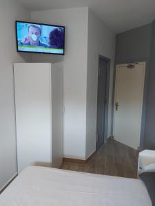 Postel nebo postele na pokoji v ubytování Ardenn'Hotel