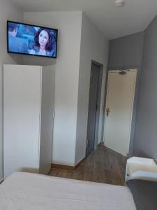 Postel nebo postele na pokoji v ubytování Ardenn'Hotel