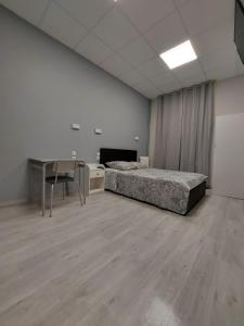 Postel nebo postele na pokoji v ubytování Ardenn'Hotel