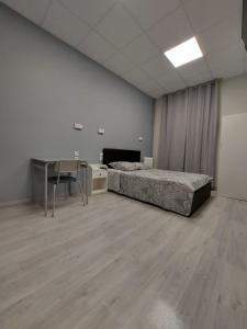 Postel nebo postele na pokoji v ubytování Ardenn'Hotel