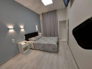 Postel nebo postele na pokoji v ubytování Ardenn'Hotel