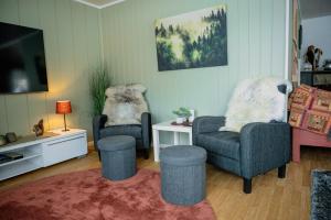 Imagine din galeria proprietății Fredfullt hus ved Oksfjordvannet în Storslett