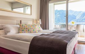 Letto o letti in una camera di Smart-HOTEL MINUSIO, a Swiss Quality Hotel