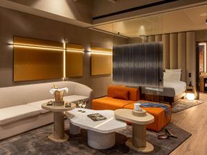 A seating area at The Emporium Hotel Plovdiv - MGallery Collection