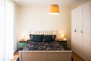 En eller flere senge i et værelse på Villa Aurora - Osimo, nuova villa con piscina