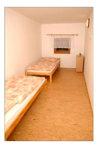 Postel nebo postele na pokoji v ubytování Penzion Daniela