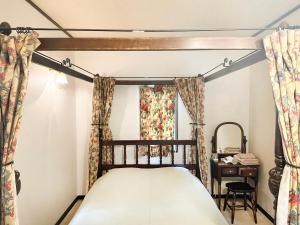 Postel nebo postele na pokoji v ubytování Gasthof Ami