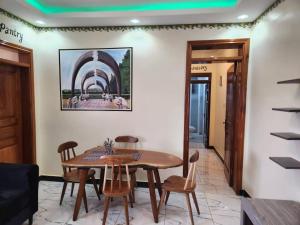Posezení v ubytování EQUATOR SUITES -KAMPALA -Ivory Mall -Bunga Gaba Road