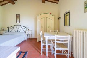 Posteľ alebo postele v izbe v ubytovaní Il Castellaro Country House + 32 fotografií