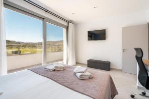 TV a/nebo společenská místnost v ubytování M&B Luxury Villa