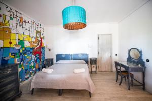 Postel nebo postele na pokoji v ubytování Villa Scilla e Cariddi