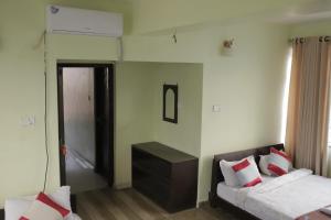 Ένα ή περισσότερα κρεβάτια σε δωμάτιο στο Hotel Arhant Inn