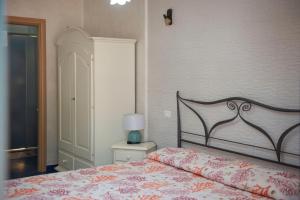 Postel nebo postele na pokoji v ubytování B&B Appartamenti l'Anfora