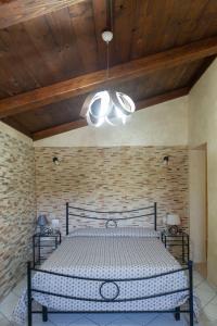 Postel nebo postele na pokoji v ubytování B&B Appartamenti l'Anfora