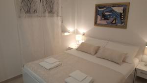 Postel nebo postele na pokoji v ubytování Rooms Valentino