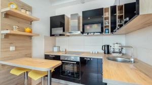 Dapur atau dapur kecil di Apartment 28 Kostanjica +3 gambar