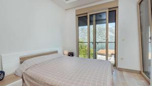 Katil atau katil-katil dalam bilik di Apartment 28 Kostanjica