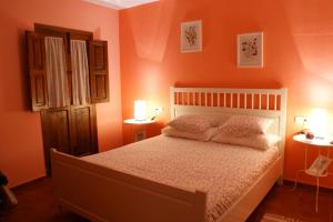 Postel nebo postele na pokoji v ubytování La Posada del Recovero