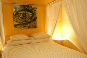 Postel nebo postele na pokoji v ubytování La Posada del Recovero