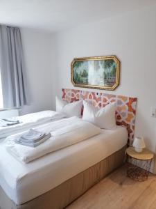 Ένα ή περισσότερα κρεβάτια σε δωμάτιο στο Gasthaus Pension Bretthäusl