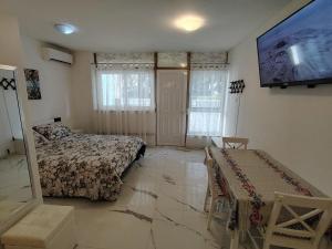 Posteľ alebo postele v izbe v ubytovaní Studio-apartman Ella