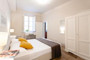 Posteľ alebo postele v izbe v ubytovaní Lanfranchi deluxe apartament + 3 fotografie