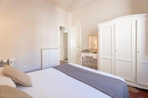 Posteľ alebo postele v izbe v ubytovaní Lanfranchi deluxe apartament