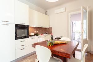 Kuchyňa alebo kuchynka v ubytovaní Lanfranchi deluxe apartament