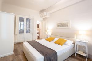 Posteľ alebo postele v izbe v ubytovaní Lanfranchi deluxe apartament