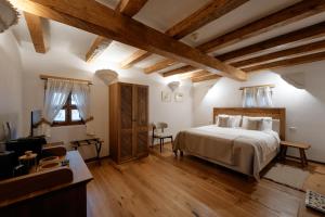 Postel nebo postele na pokoji v ubytování Matca Hotel Relais & Châteaux