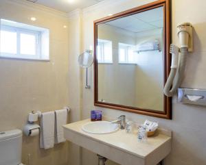 Koupelna v ubytování Hotel MS Tropicana