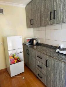 Η κουζίνα ή μικρή κουζίνα στο Kigali City Stay