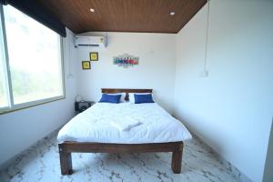 Una cama o camas en una habitación de V P Stay 2 fotos más
