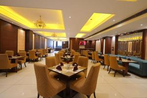 Posezení v ubytování Hotel Kohinoor Palace, Ludhiana