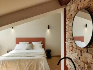 Postel nebo postele na pokoji v ubytování Chambres d'hôtes - Bed and Breakfast Les Palmiers