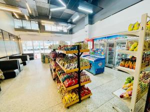 a grocery store aisle with a lot of products at Lamoon Kim Yong in Hat Yai