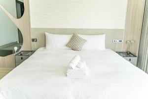 Letto o letti in una camera di 眺浪島民宿