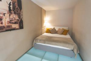 Voodi või voodid majutusasutuse Borgo Suite Apartment toas