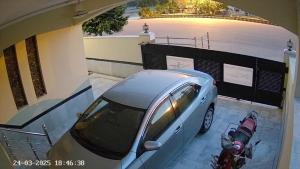 a car parked in a garage next to a motorcycle at 2 BHK GF - Villa in Bahria Enclave, Islamabad in Islamabad +8 photos