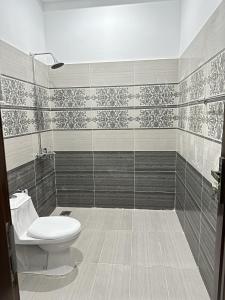 a bathroom with a toilet and a shower at 2 BHK GF - Villa in Bahria Enclave, Islamabad in Islamabad