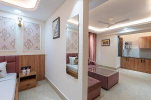 Kuchyň nebo kuchyňský kout v ubytování Aatithyam Residency-Golf Course Road Gurgaon