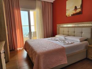 Postel nebo postele na pokoji v ubytování Hotel Maren Durres