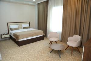 Postel nebo postele na pokoji v ubytování Gabala Bless Hotel Cottage + 57 fotografií