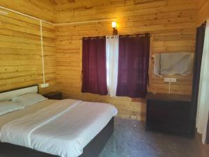 Postel nebo postele na pokoji v ubytování Nature Trinket Retrea